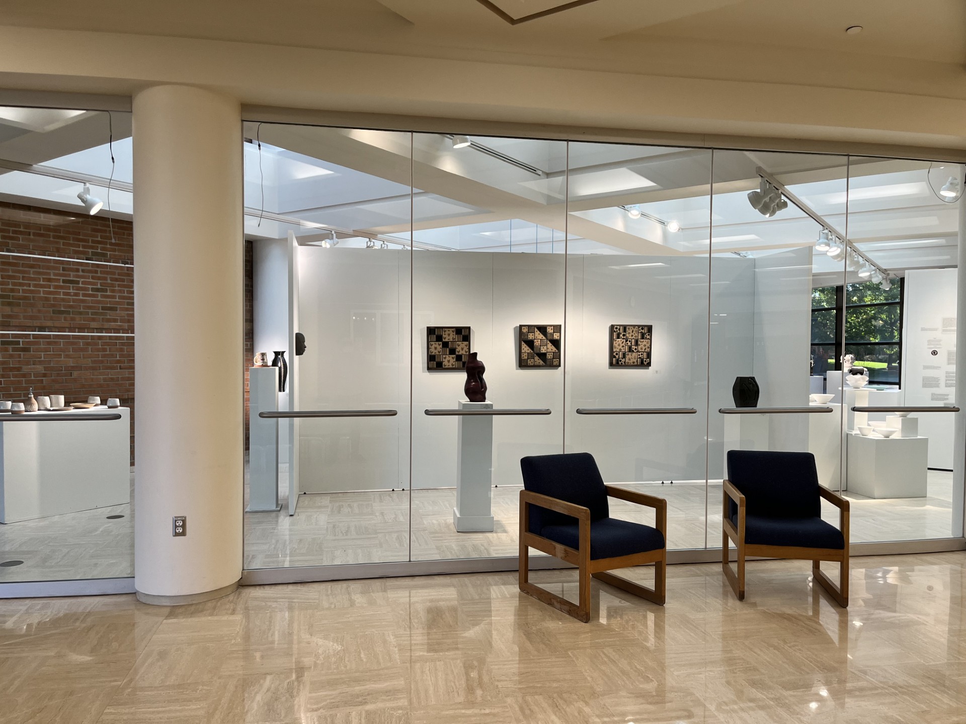 Ceramic Alumni exhibition from the lobby looking in on Davis, VisGirda, Clark, Grooms, Watz and Bio wall(L-R)